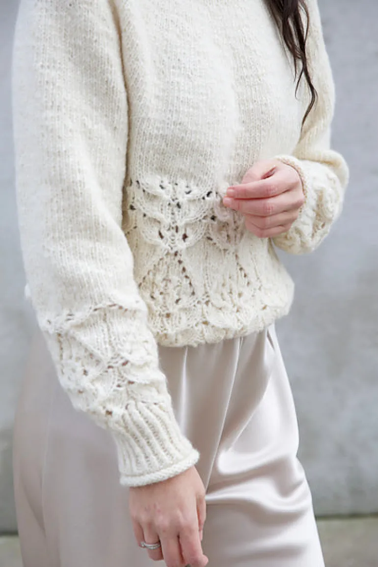 Blanc de Blancs Sweater by Leeni Hoimela, in english