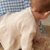 Sandnes Garn Dina Peplum Cardigan Baby 2407_07, English